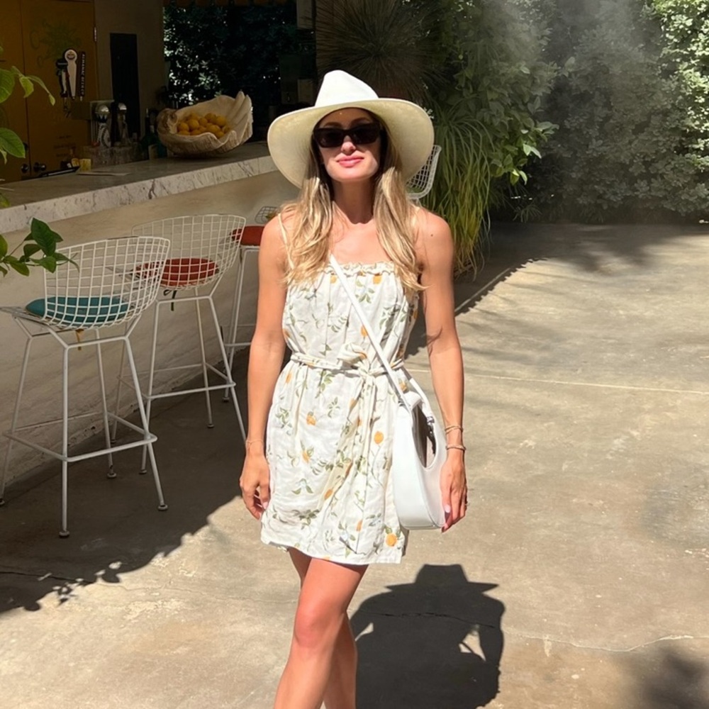 Reformation linen lemon mini dress with waist tie. Perfect for spring vacations